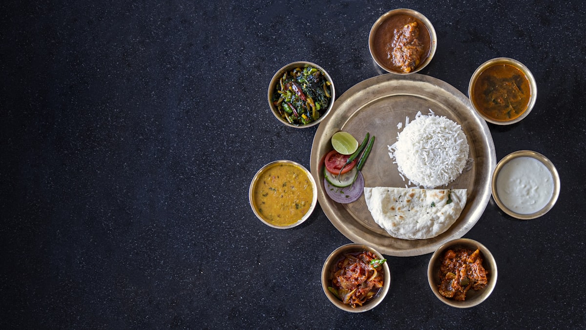 Thali with dal, chutneys and rice
